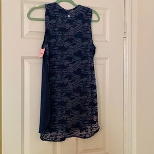 27. Blue top with fun design on the back